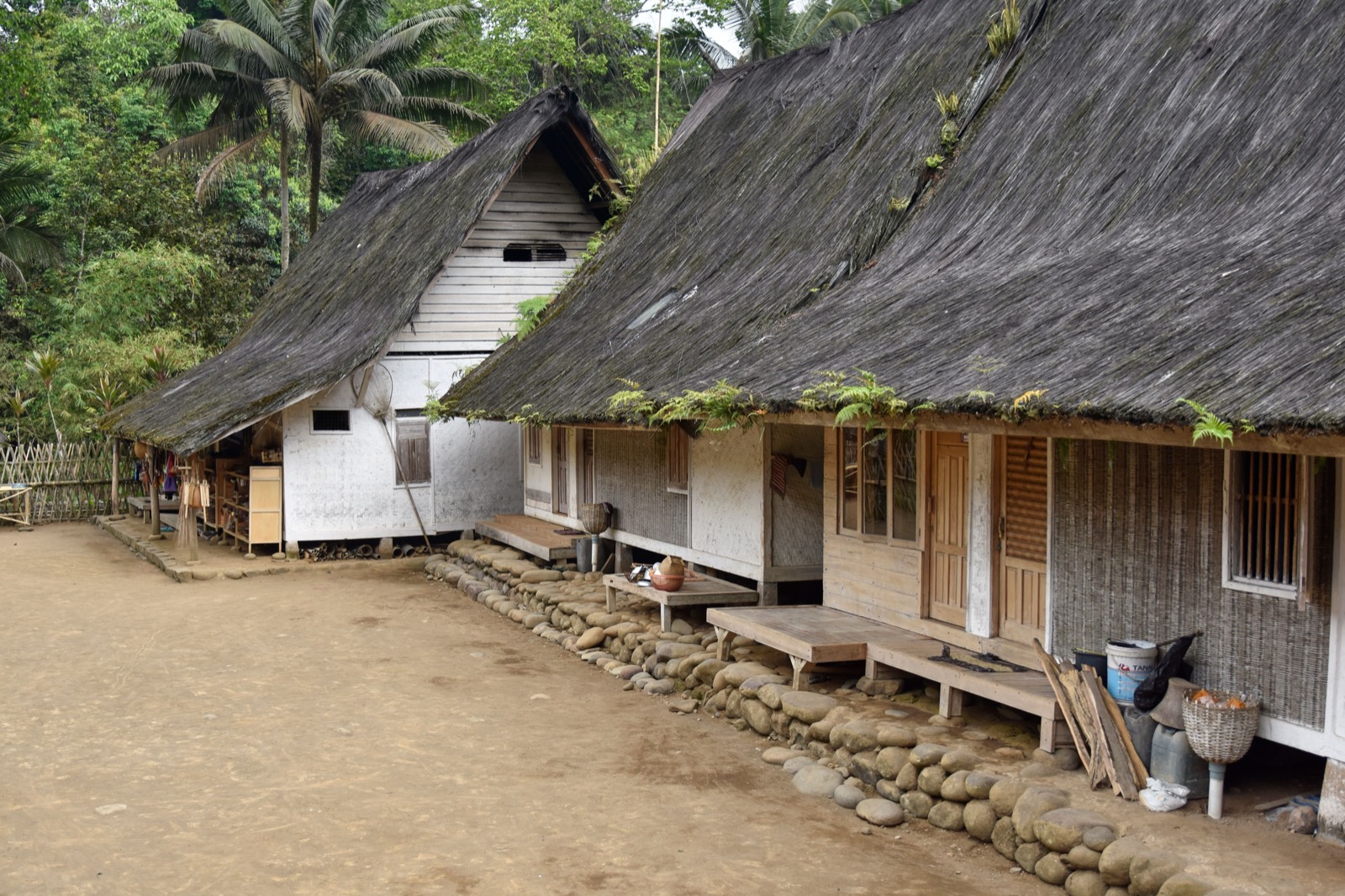 A traditional bamboo and timber house in a tropical setting