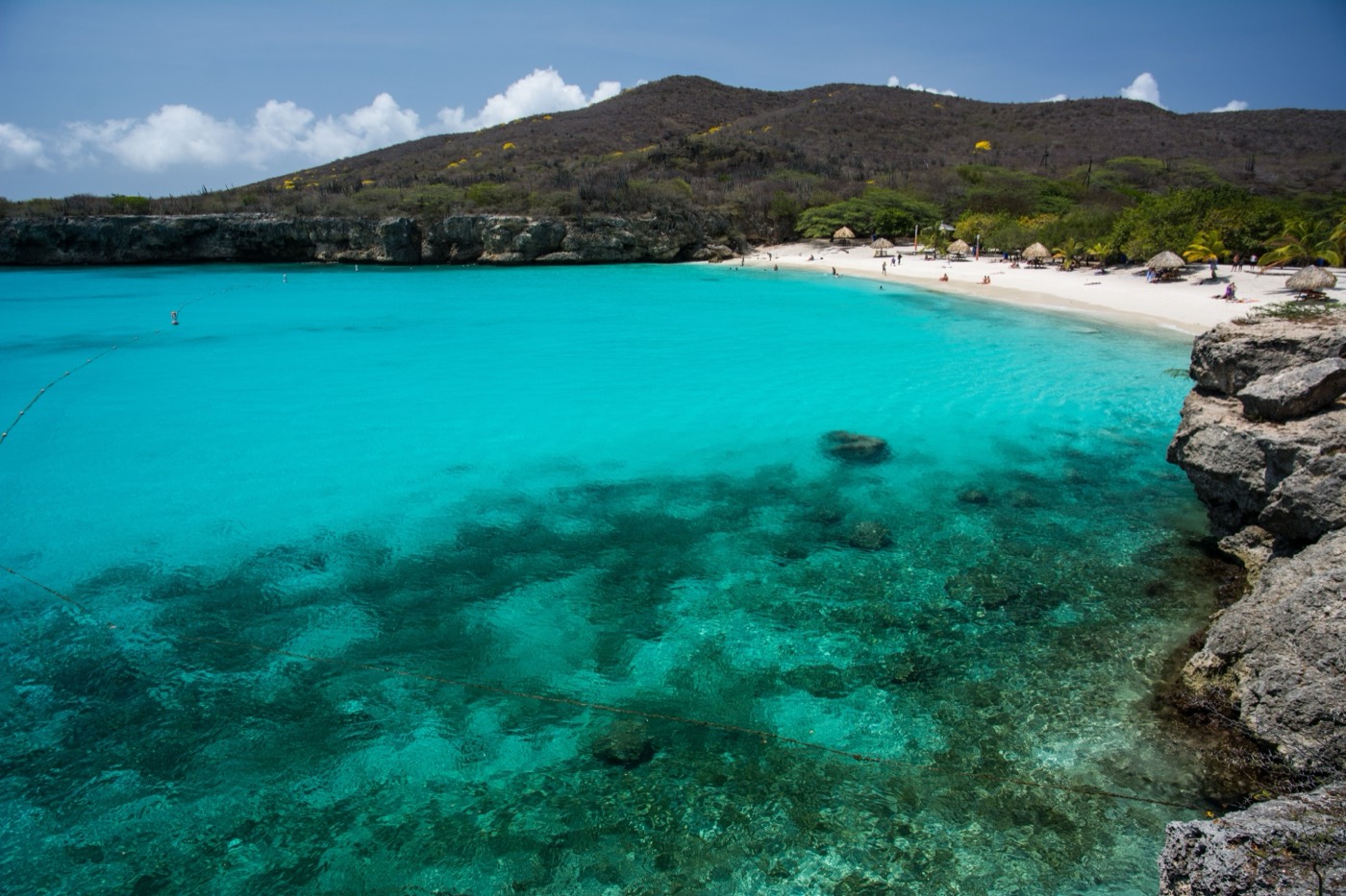 A turquoise cove with cliffs on Curaçao's coast