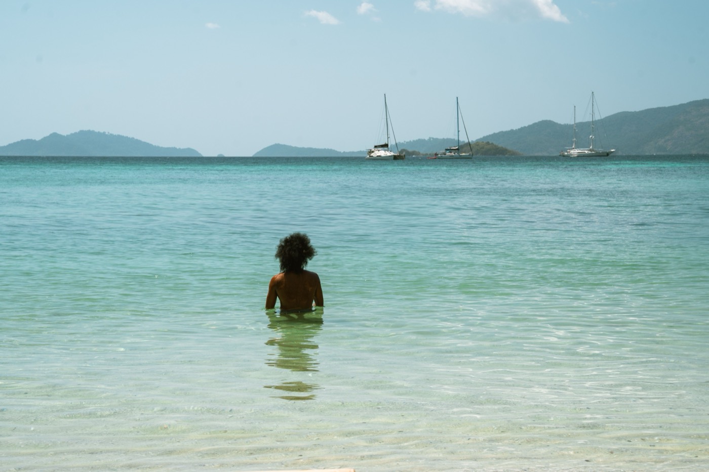 Turquoise water and anchored sailboats in the Grenadines