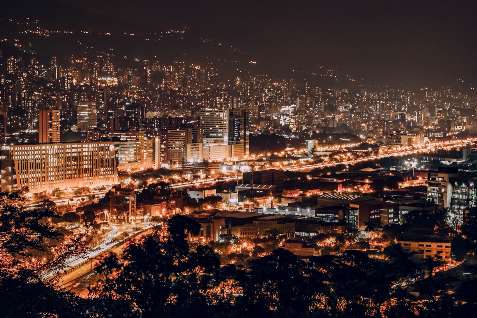 Medellín's city lights filling the valley at night