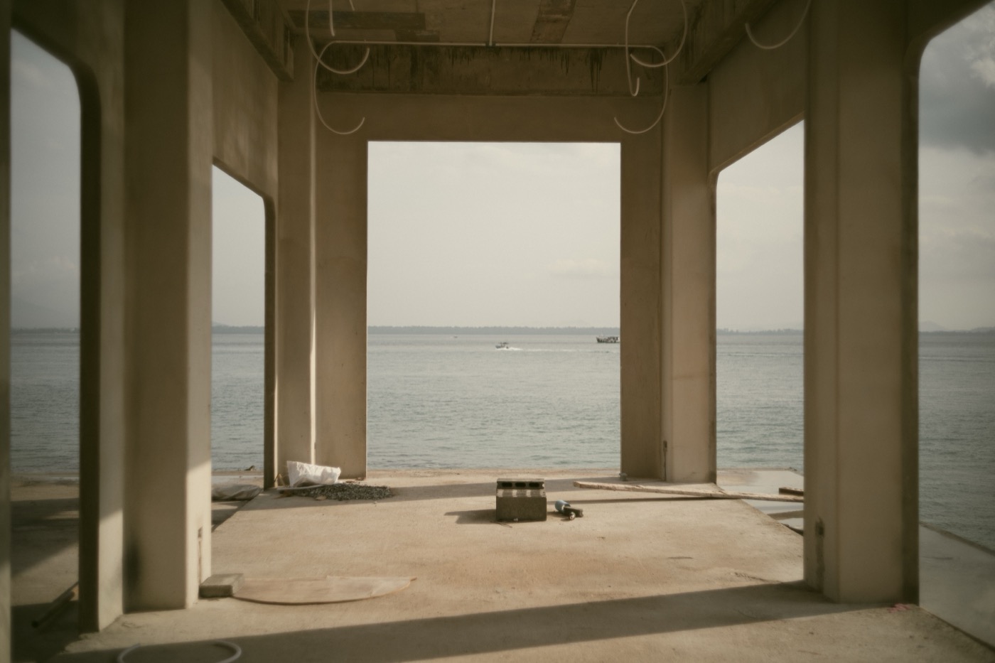 A concrete home under construction in Panama — highland builds avoid the logistics premium of island and coastal sites